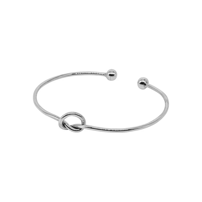 knot design oval torque silver bangle 