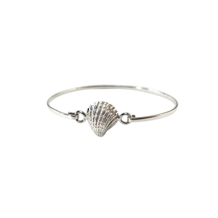 oval silver bangle with a shell attached