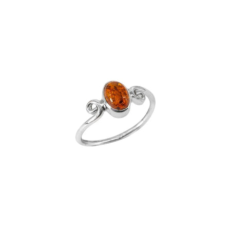 oval amber dress ring in silver with swirl shoulders